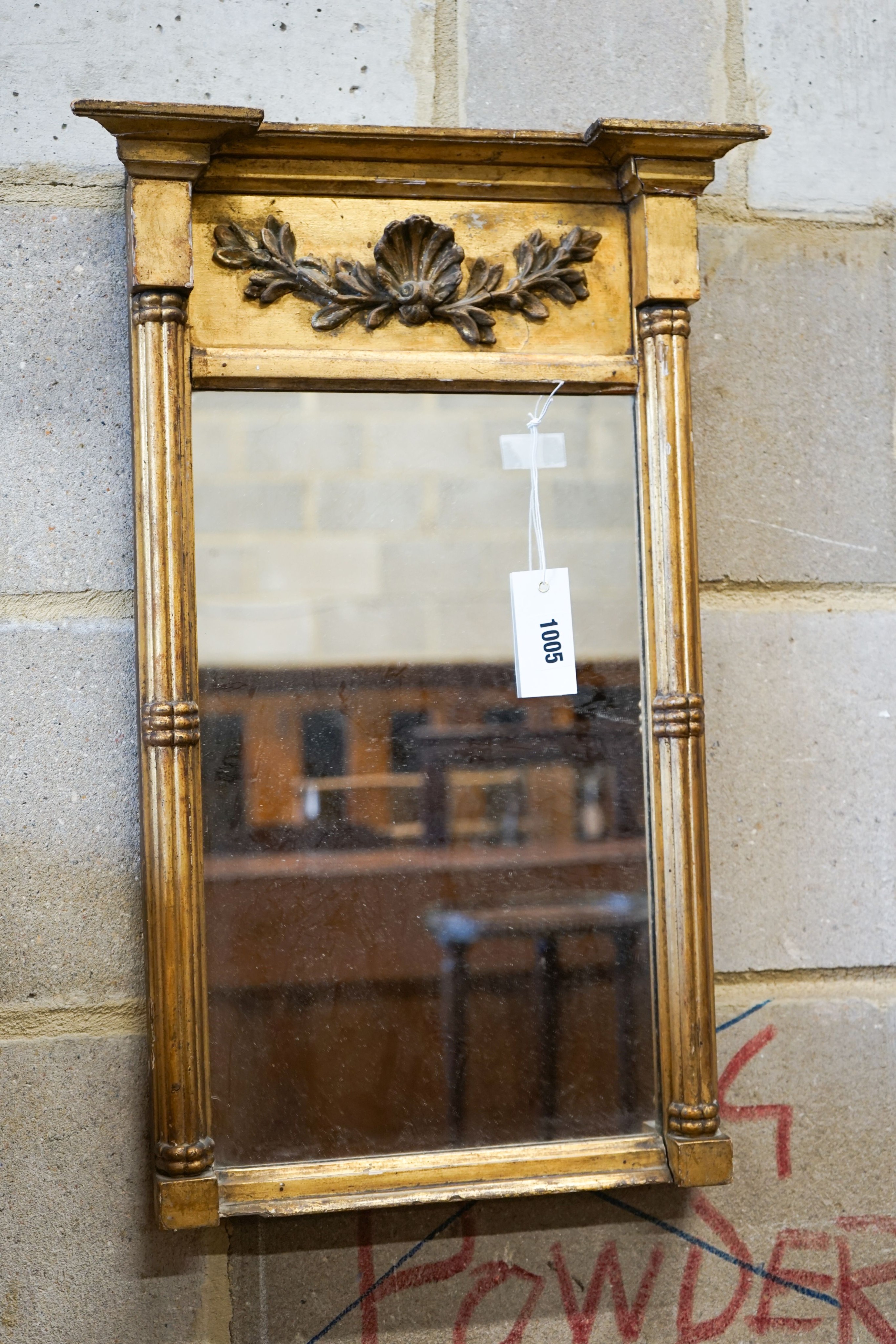 A small Regency giltwood and gesso pier glass, width 37cm, height 59cm